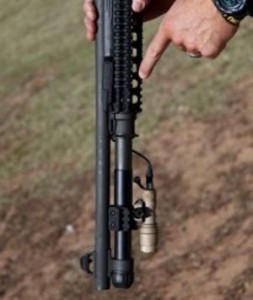This Benelli M-4 sports weapon-mounted light (SureFire Scout with pressure switch) and rugged front sight. Both are critical components on a defensive shotgun.