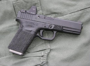 Bowie Tactical Glock with red dot sight. While I don’t recommend building a defensive gun without backup iron sights, I do think the sights are now getting durable enough to consider it.