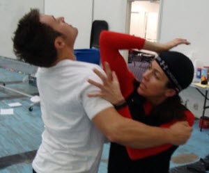 Person practicing an elbow to throat strike