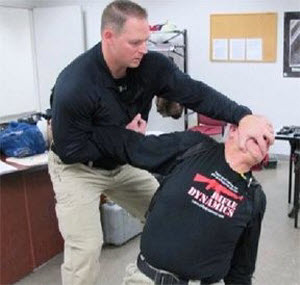 Chris demonstrates take-down during handgun retention and response training.