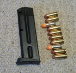 Dummy ammunition included randomly in magazine.
