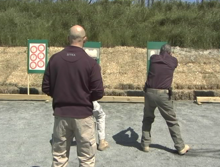 Men outside at a shooting range
