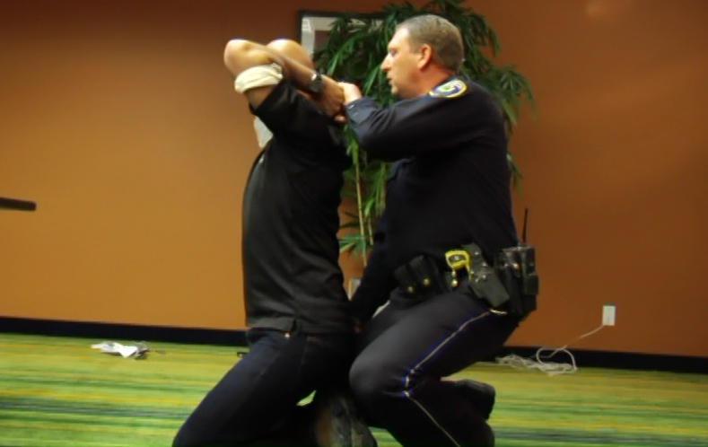 Police officer doing a takedown