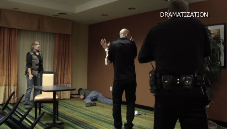Dramatized shooting scene with a police officer