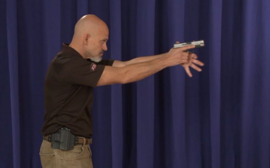 Man aiming a pistol