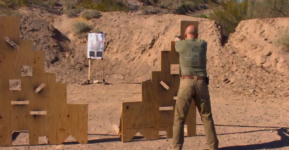 Practicing at a shooting range around obstacles