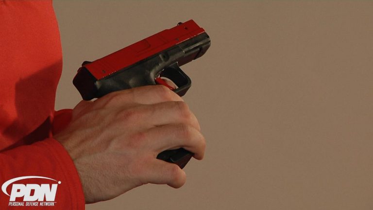 Handgun with red stripe