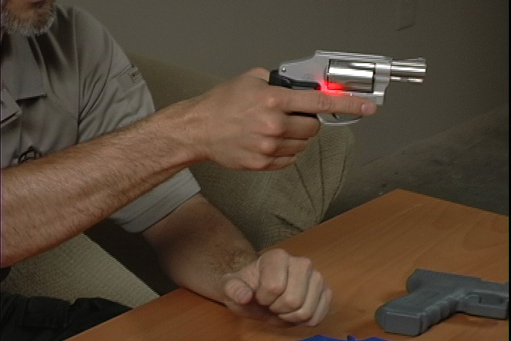 Laser device on a revolver