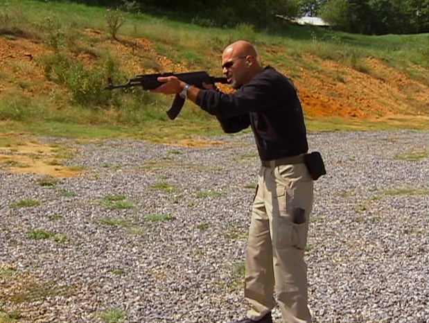 Man aiming an AR-15