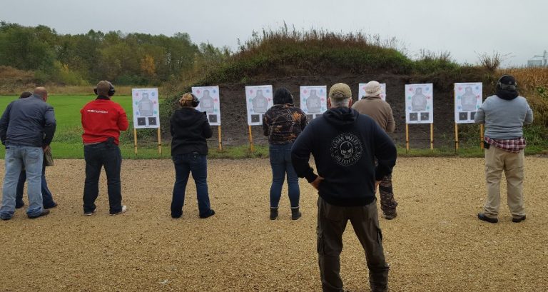 People outside practicing firing