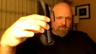 Man holding a weapon