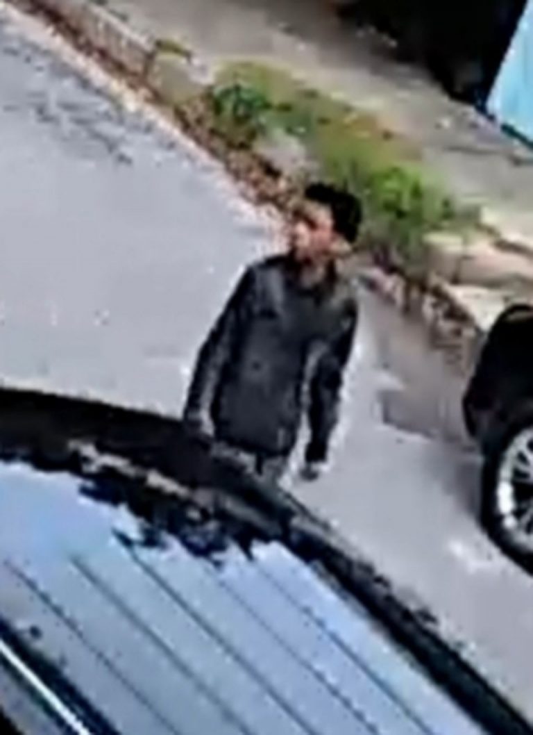 Surveillance footage of a person outside