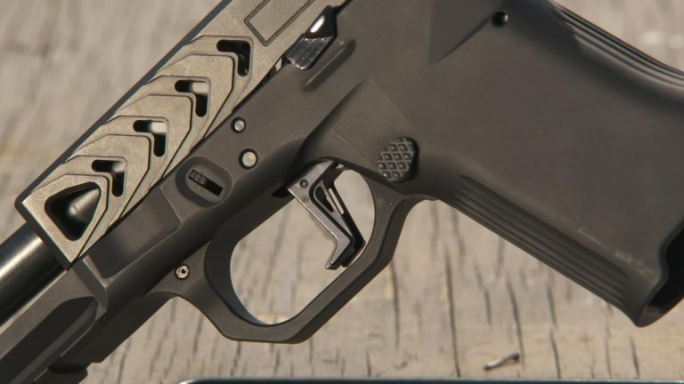 Side view of a trigger on a handgun