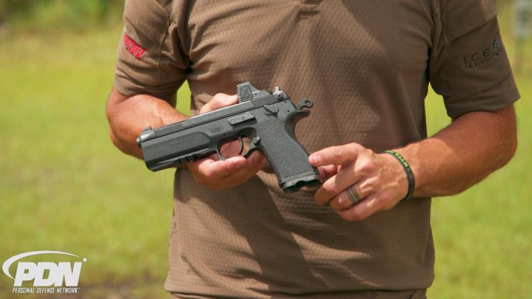 Person holding a pistol