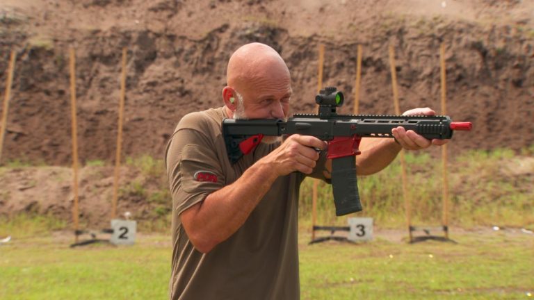 Man with a training gun