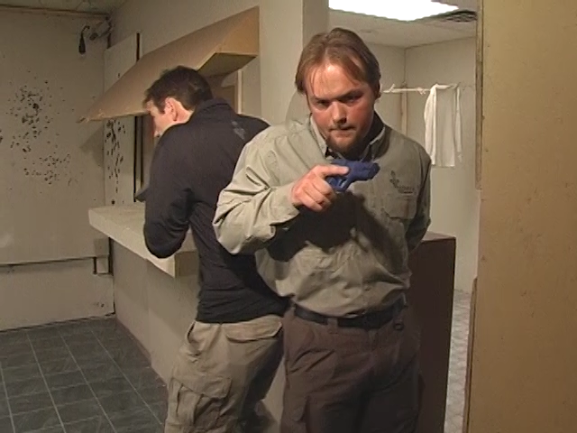 Men simulating a home entry