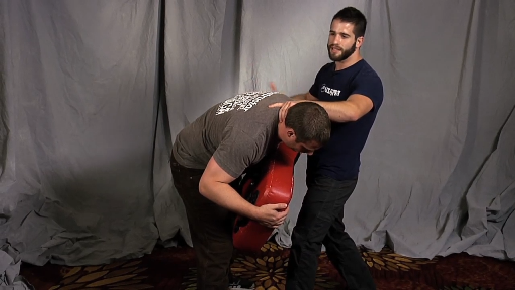 Two men practicing self-defense