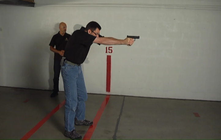 Man aiming a pistol