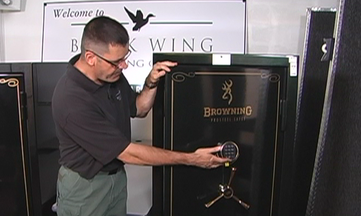 Man opening a gun safe