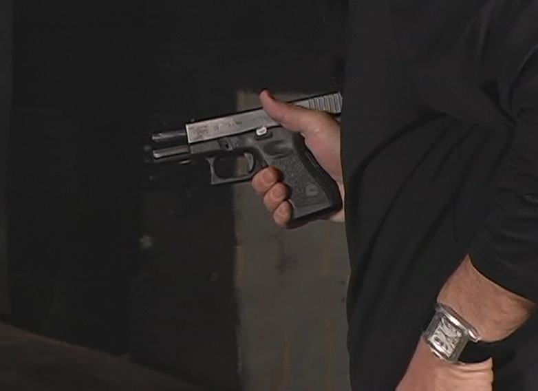 Person holding a handgun