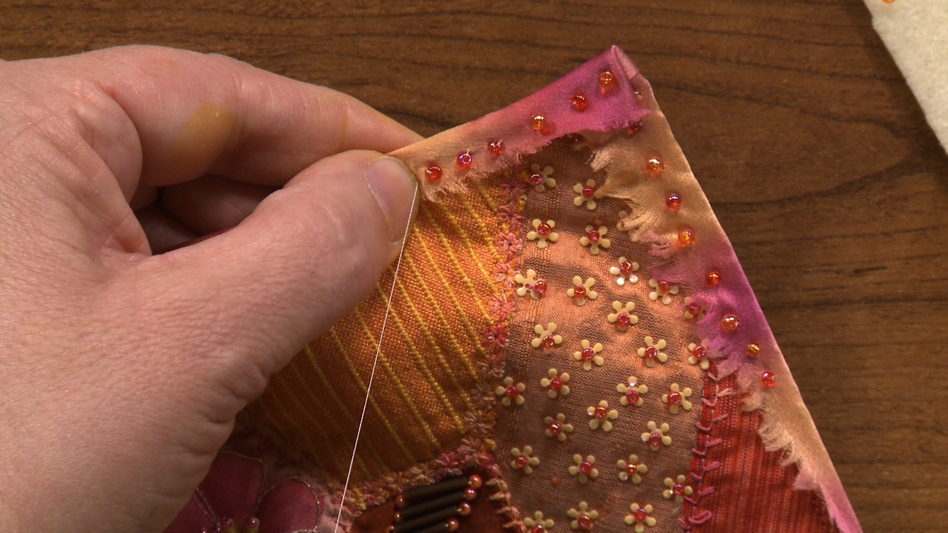 Binding a Quilt with Ribbon and Beads