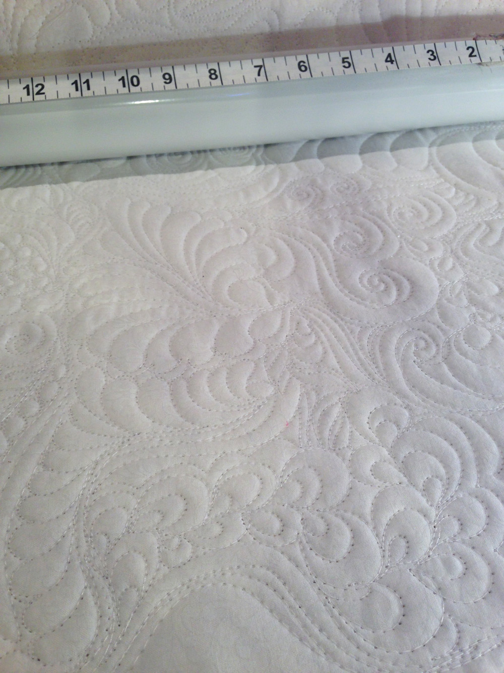 Here is some of my practice work using the McTavishing technique on my longarm.