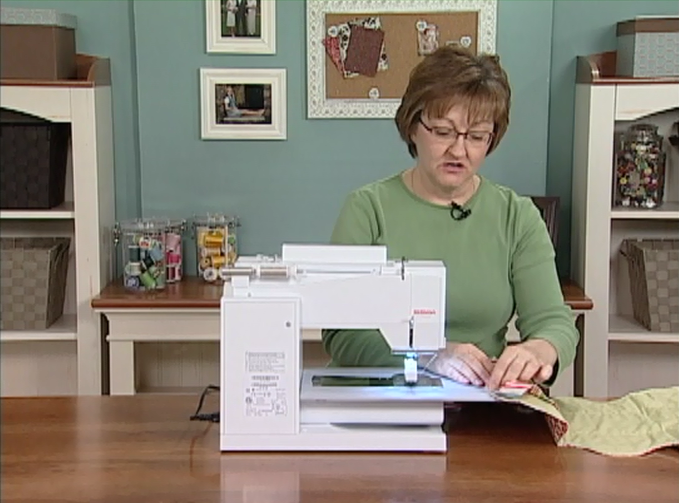 Woman at a sewing machine
