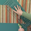 Cutting with a rotary cutter against a quilting ruler