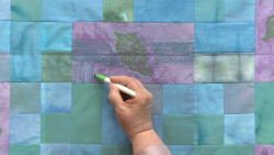 Drawing on a quilt with a fabric marker
