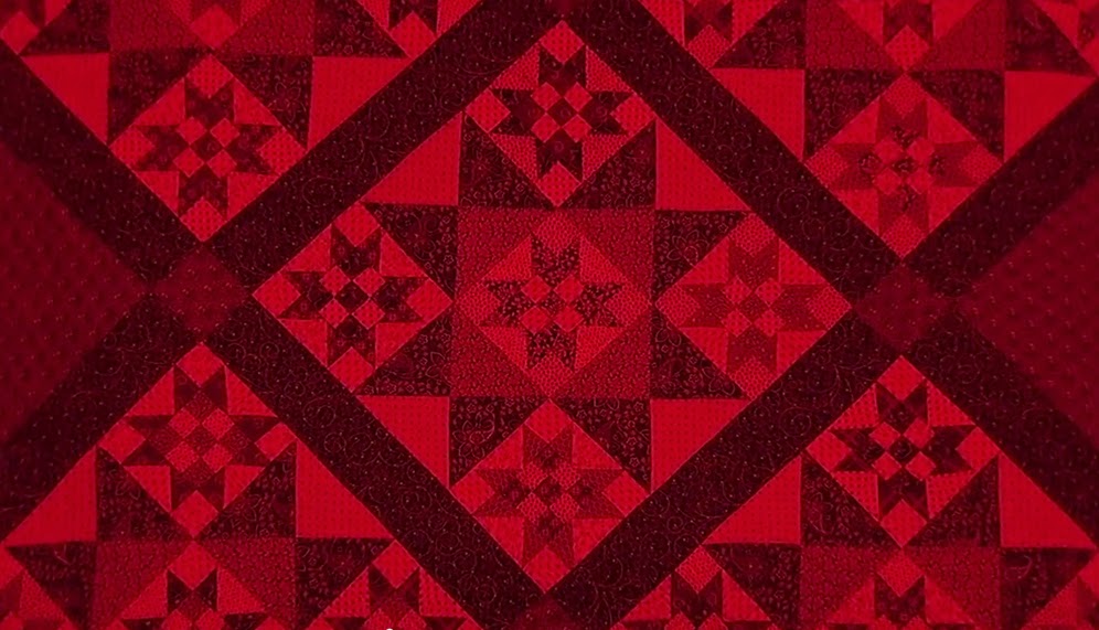 Quilt seen with sew red glasses on