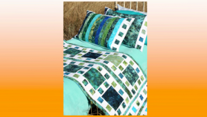 Quilted bed runner and pillow shams