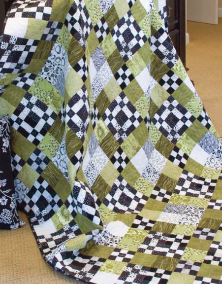 Green, black and white quilt