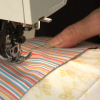 Sewing colorful thin striped fabric