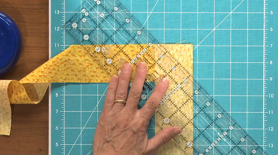 Putting together yellow fabric strips