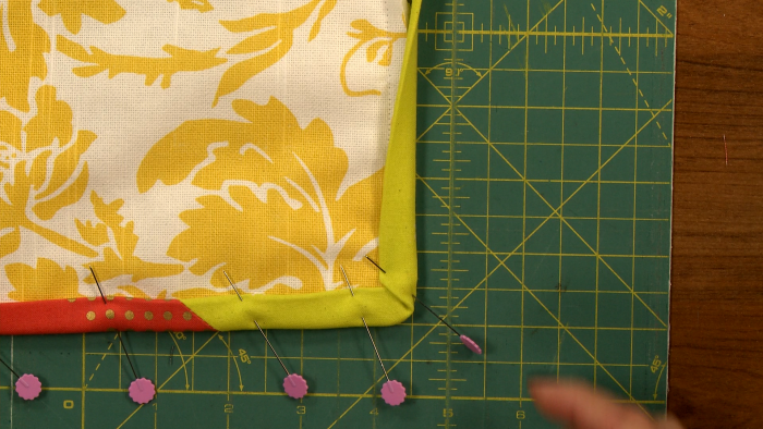 Pinning sides of a quilt