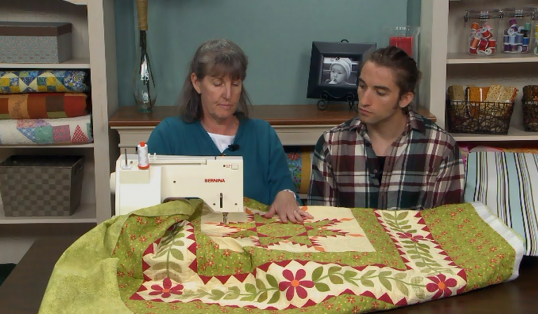 Woman and guy quilting
