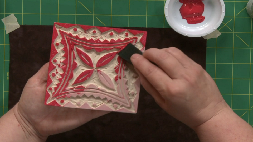 Painting the bottom of a stamp
