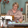 Woman quilting on a machine