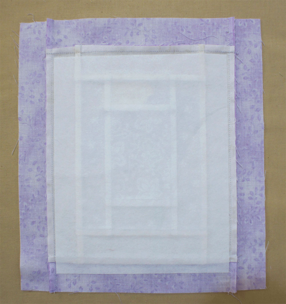 Back of a purple quilted cornflower square