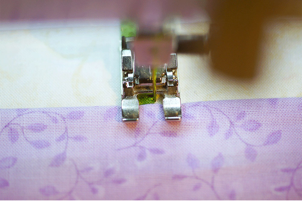 Close up of sewing machine foot