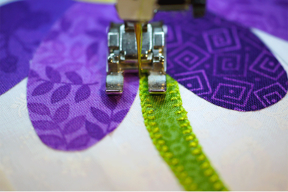 Close up of stitched fabric flower stem