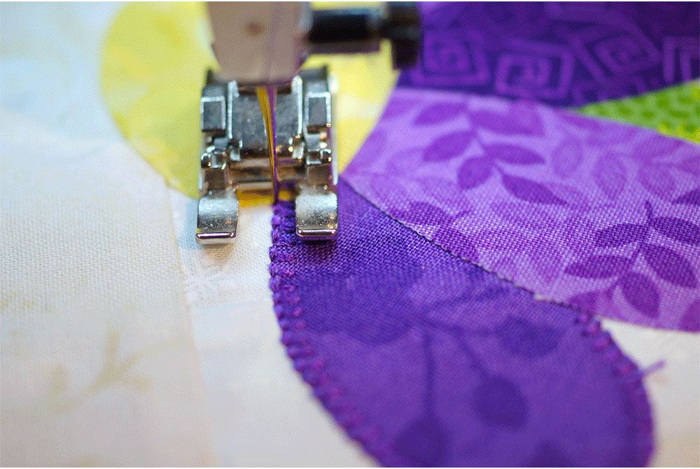 Stitching around a fabric petal