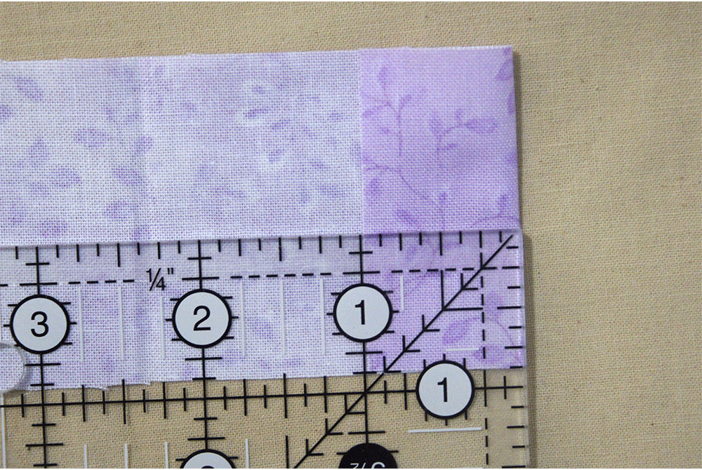 Folded strip of fabric