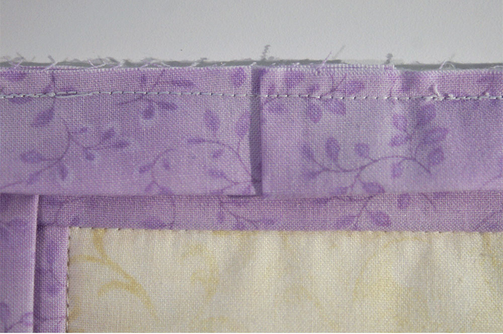 Sewing purple fabric