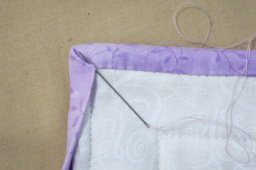 Hand stitching a corner