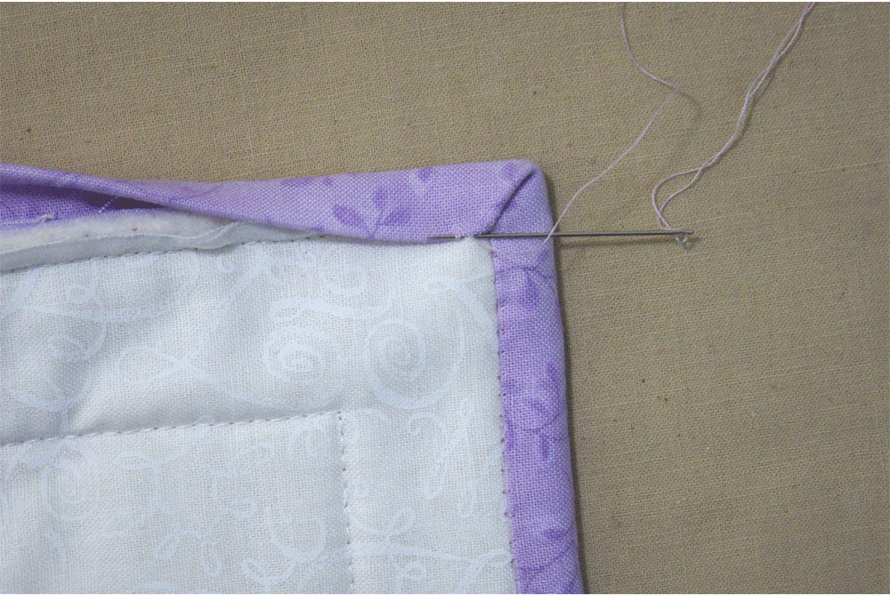 Hand stitching a corner
