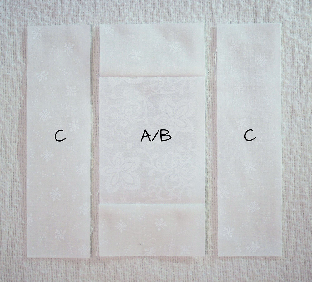 White fabric labeled with A and B