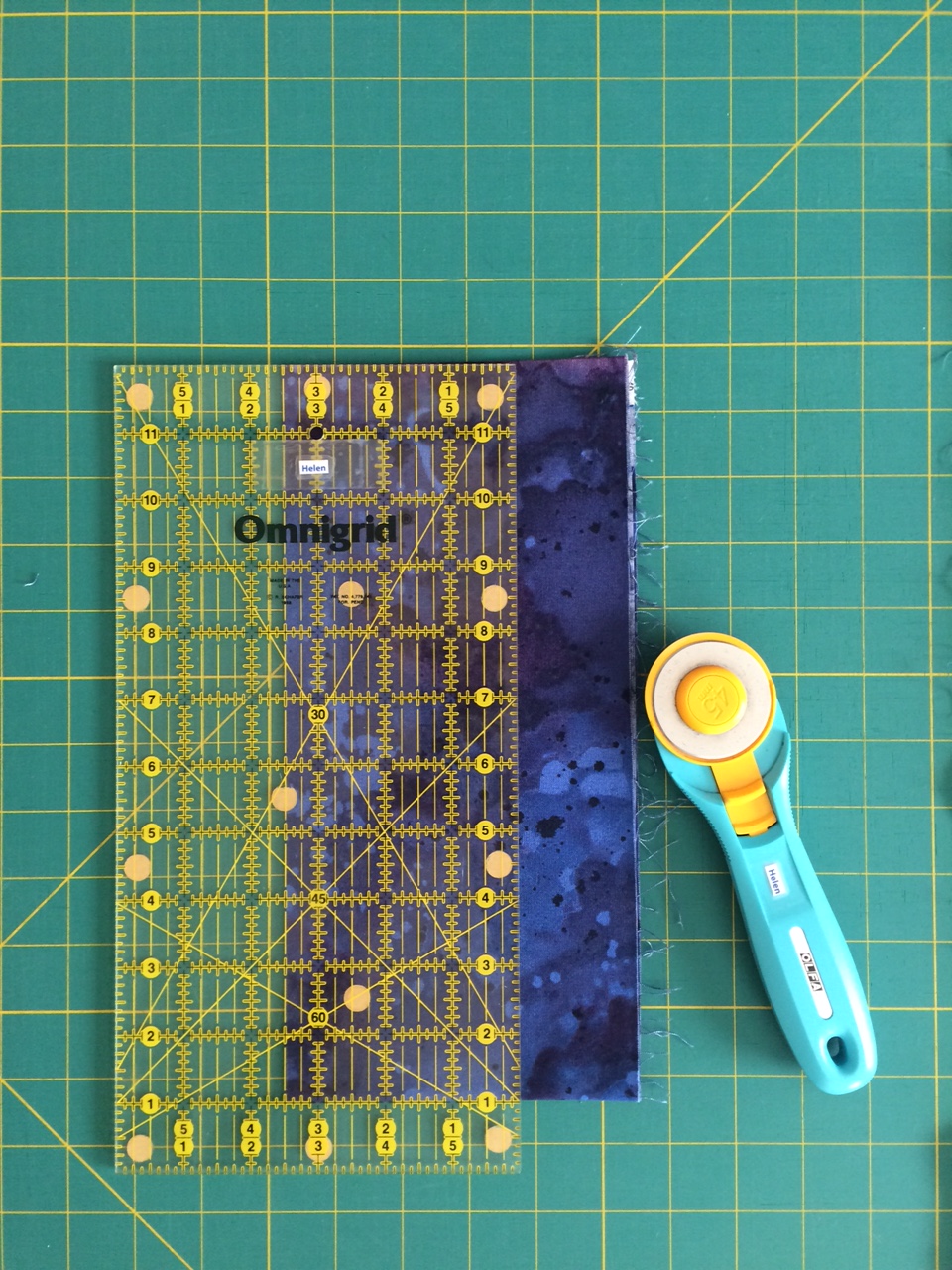 Fabric on a cutting mat with a grid