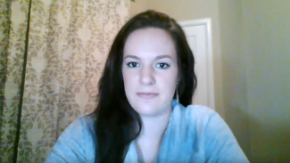 Screenshot of a woman on video