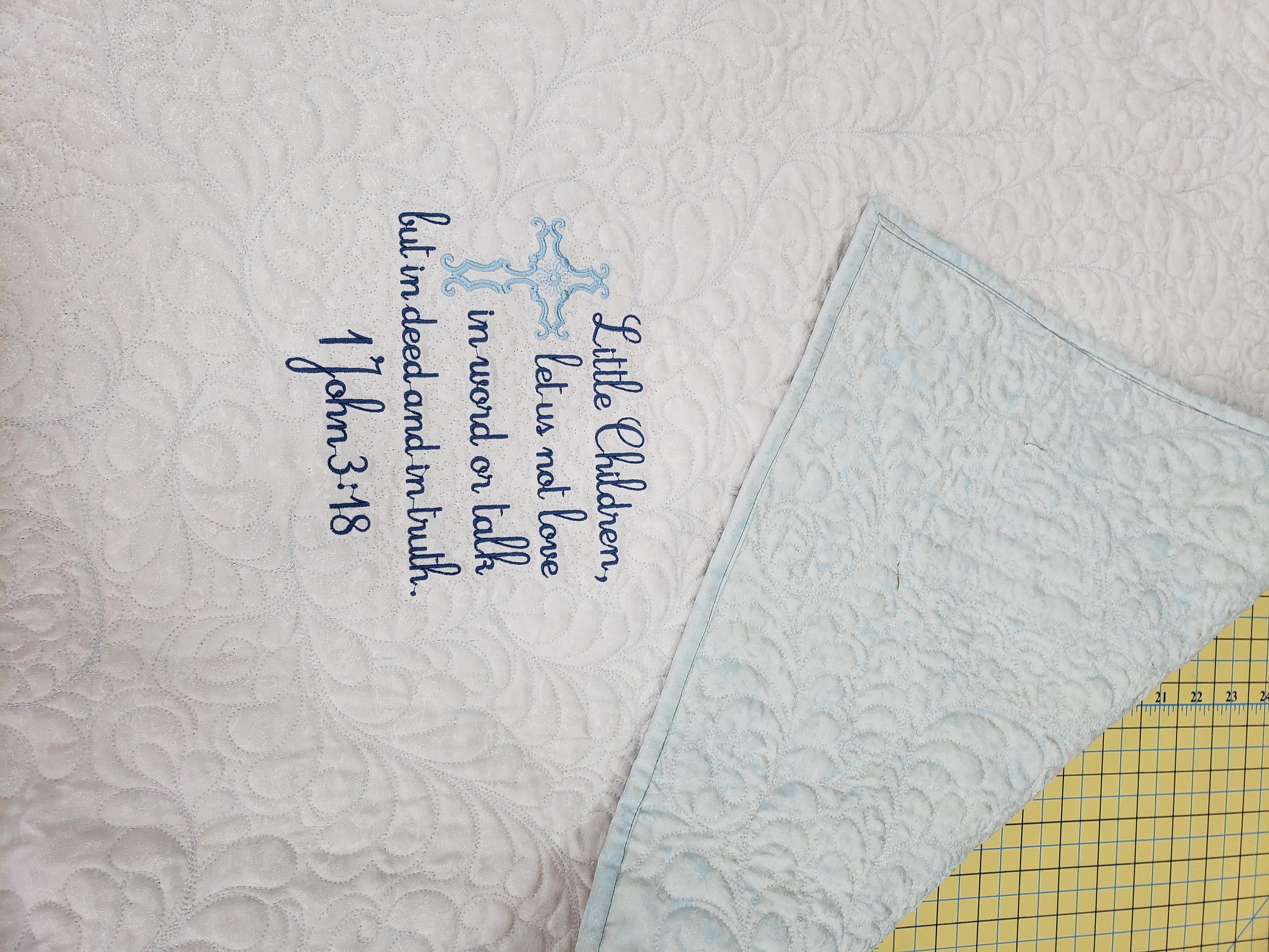 back of quilt with embroidery
